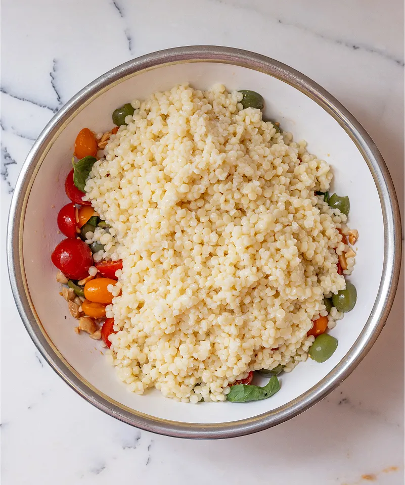 Add cooked pearl couscous