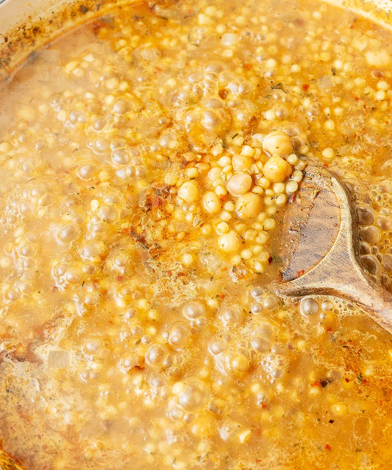 Simmer chickpeas and pearl couscous
