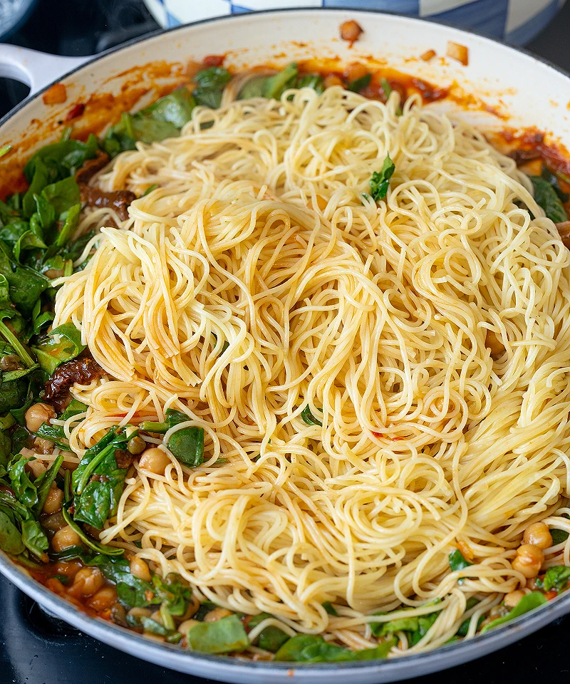 Add cooked pasta