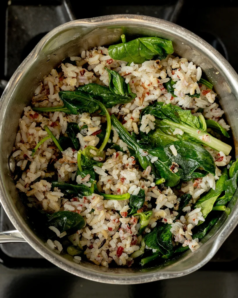 Stir greens into rice